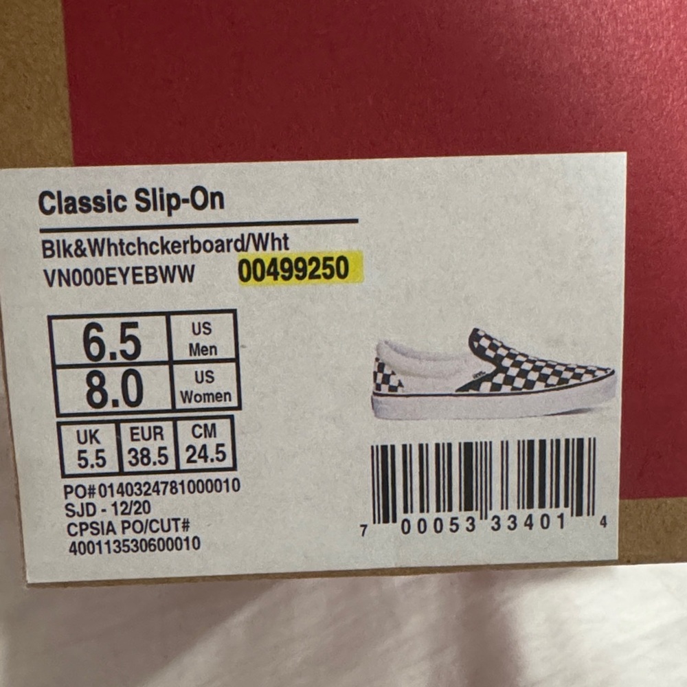 Vans Black and White Checkerboard Slip-Ons